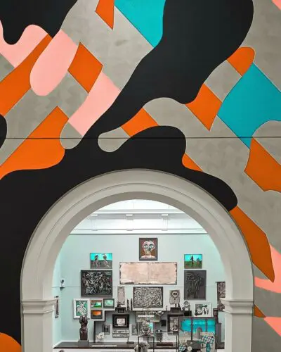 Colorful wall with art gallery interior